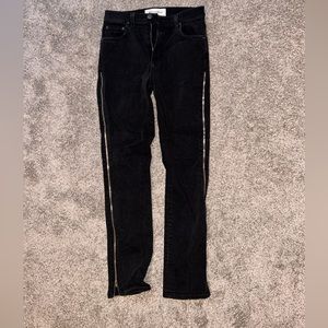 Reformation jeans with gold zipper design on the side
